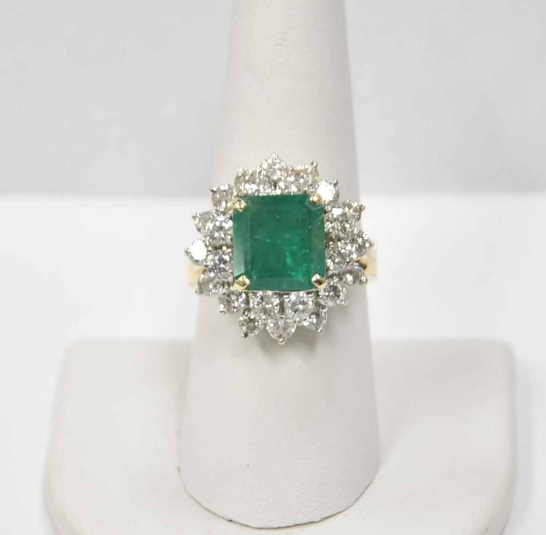 5ct PRINCESS CUT EMERALD & DIAMOND RING: ANTIQUE 5ct PRINCESS CUT EMERALD SURROUNDED BY (24) 15-20 POINT DIAMONDS ; SET IN 2-TONE WHITE & YELLOW GOLD SETTING ; SIZE 8 3/4 ; 8.95grams