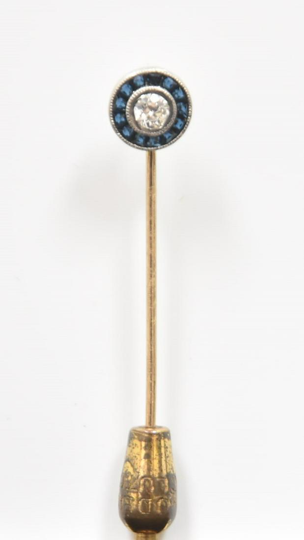 ART DECO SAPPHIRE & DIAMOND STICK PIN: ART DECO 14kt WHITE GOLD STICK PIN WITH 25 POINT ROUND CUT DIAMOND SURROUNDED (14) SMALL SQUARE CUT SAPPHIRES - 1.7grams WITHOUT NOT GOLD PIECE - 2 3/4" LONG