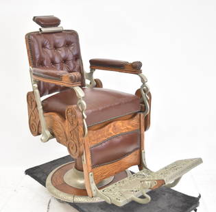 Antique Koken Tufted Leather Hydraulic Barber Chair.