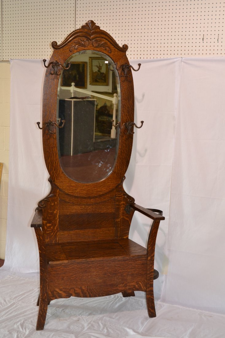 TIGER OAK HALL SEAT WITH LIFT TOP WITH BEVELED: MIRROR , CARVED CREST & (4) RACKS - 34" x 16" x 77"