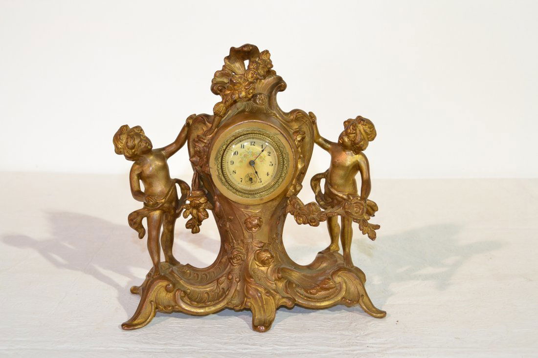 GILT METAL ART NOUVEAU NEW HAVEN CLOCK WITH: CHERUBS - HOLE ON BACK LEG - 9 1/2" x 10"