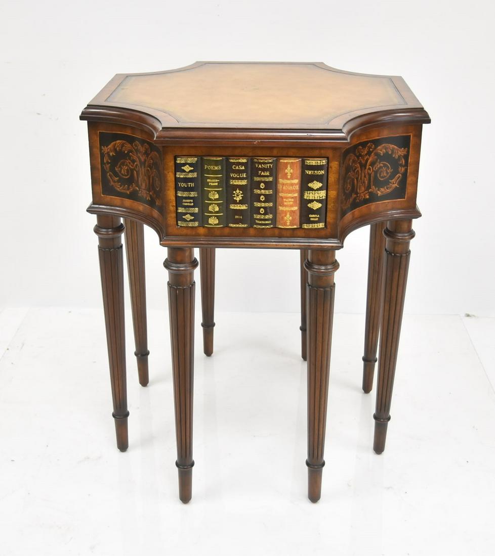 MAITLAND SMITH FAUX BOOK FORM LIBRARY TABLE: MAITLAND SMITH TOOLED LEATHER LIBRARY TABLE WITH (4) FAUX BOOK DRAWER FRONTS & GOLD TOOLED LEATHER TOP ON (8) TAPERED COLUMNAR LEGS - 24" x 29"