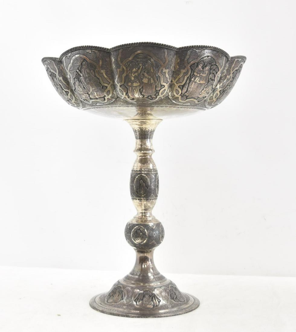 MONUMENTAL PERSIAN SOLID SILVER TAZZA CENTERPIECE: MONUMENTAL PERSIAN SOLID SILVER TAZZA CENTERPIECE WITH (11) DEEP RELIEF FIGURAL MEDALLIONS SURROUNDED BY ENGRAVED DAMASCENE DESIGNS - 20 1/2" x 26" ; APPROXIMATELY 198ozt
