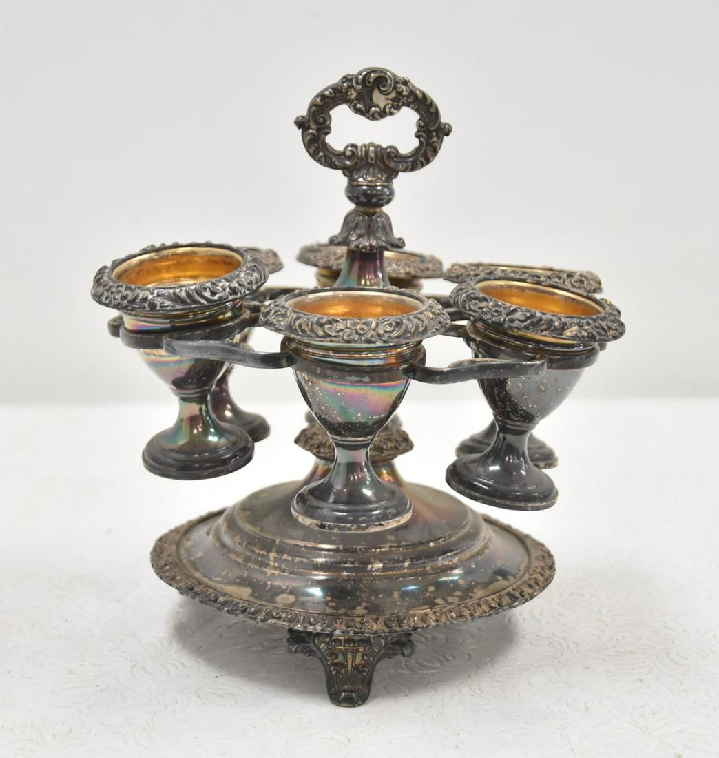 VICTORIAN SILVER PLATE EGG CUP HOLDER: VICTORIAN SILVER PLATE EGG CUP HOLDER WITH (6) CUPS IN FITTED STAND -7" x 8"