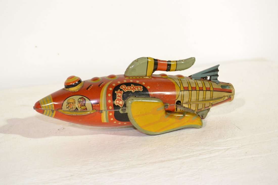 LOUIS MARX & Co. BUCK RODGERS POLICE PATROL ROCKET: WIND UP TO ca. 1939 - 12" LONG (WORKING , HAS SOME MINOR PAINT LOSS)
