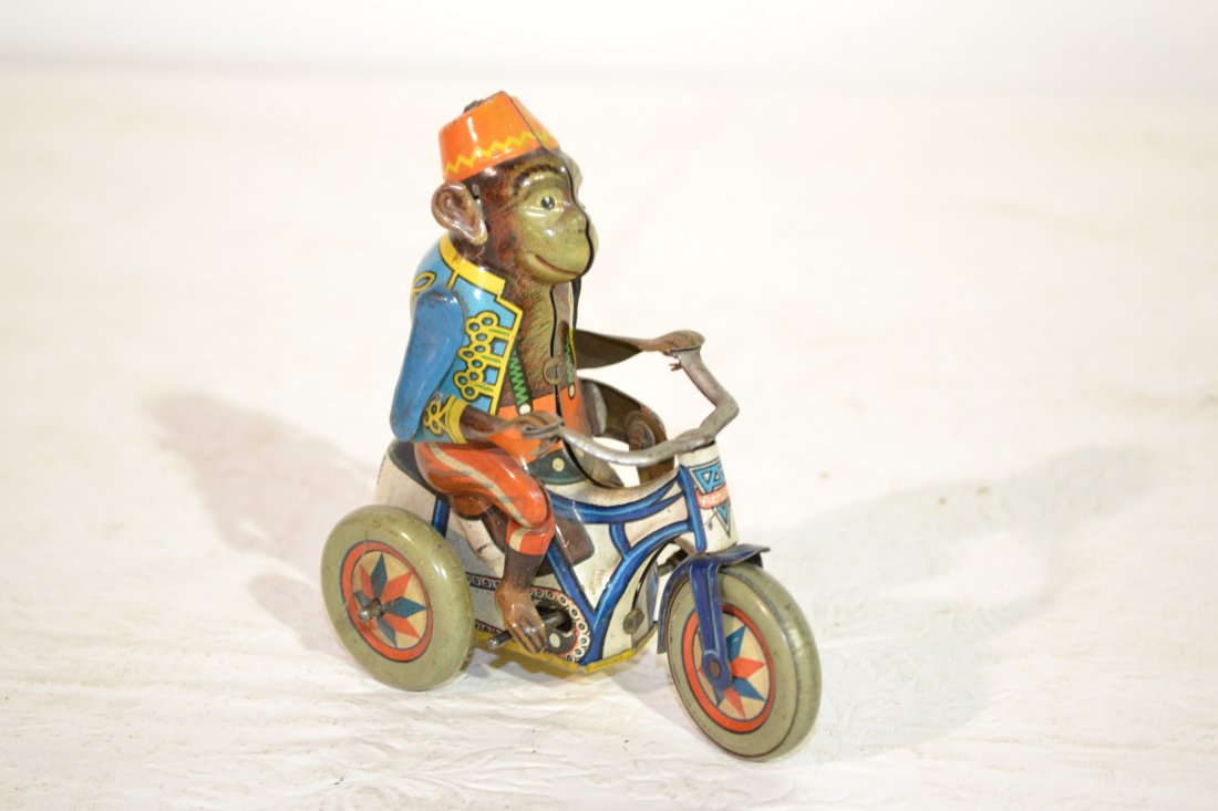 US ZONE GERMANY MONKEY ON BIKE TIN WIND UP TOY: US ZONE GERMANY MONKEY ON BIKE TIN WIND UP TOY 3 1/2" x 4" (MISSING WIND UP KEY)