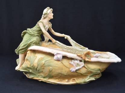 ROYAL DUX ART NOUVEAU CENTERPIECE: ROYAL DUX ART NOUVEAU CENTERPIECE GIRL WRAPPED AROUND SHELL CENTERPIECE - 19" x 10" x 12 1/2" (HAS CRACK ON BASE)