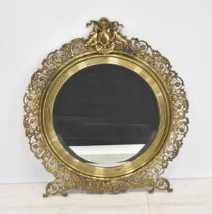 LARGE FRENCH BRONZE BEVELED VANITY MIRROR: LARGE RETICULATED FRENCH BRONZE BEVELED MIRROR WITH PUTTI MEDALLION - 22" x 26"