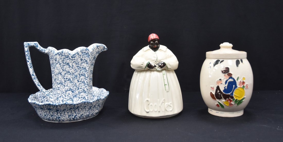 (3) ANTIQUE McCOY POTTERY PIECES: ANTIQUE BLACK AMERICANA McCOY "MAMMY" AUNT JEMIMA COOKIE JAR - 11" TALL / COLD PAINTED McCOY POTTERY COOKIE JAR WITH PAINTED DUTCH BOY , ca 1945 (SOME PAINT LOSS) / McCOY POTTERY SPLATTER BOWL & PITCH