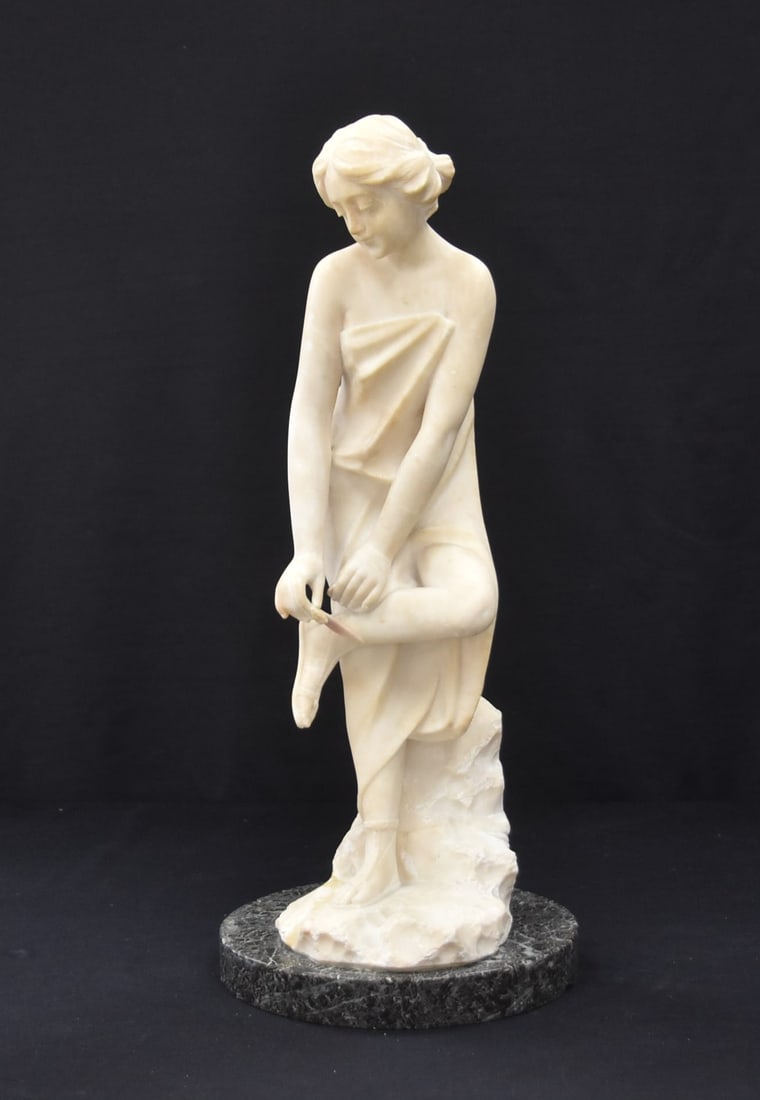 CLASSICAL STYLE ALABASTER SCULPTURE OF WOMAN: CLASSICAL STYLE ALABASTER SCULPTURE OF WOMAN FIXING SHOE - 8" x 19"