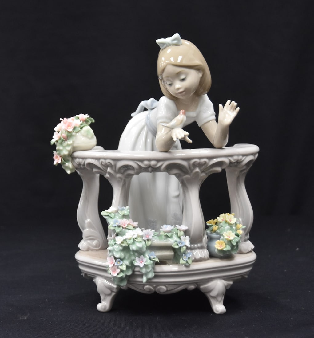 LLADRÓ "MORNING SONG" , # 6658: LLADRO MODEL 6658 , "MORNING SONG" OF YOUNG GIRL LEANING ON FLOWERY FENCE WITH BIRD , Spanish Name: El Despertar de La Primavera ,Sculptor: Jose Javier Malavia - 7" x 5" x 9 1/4"