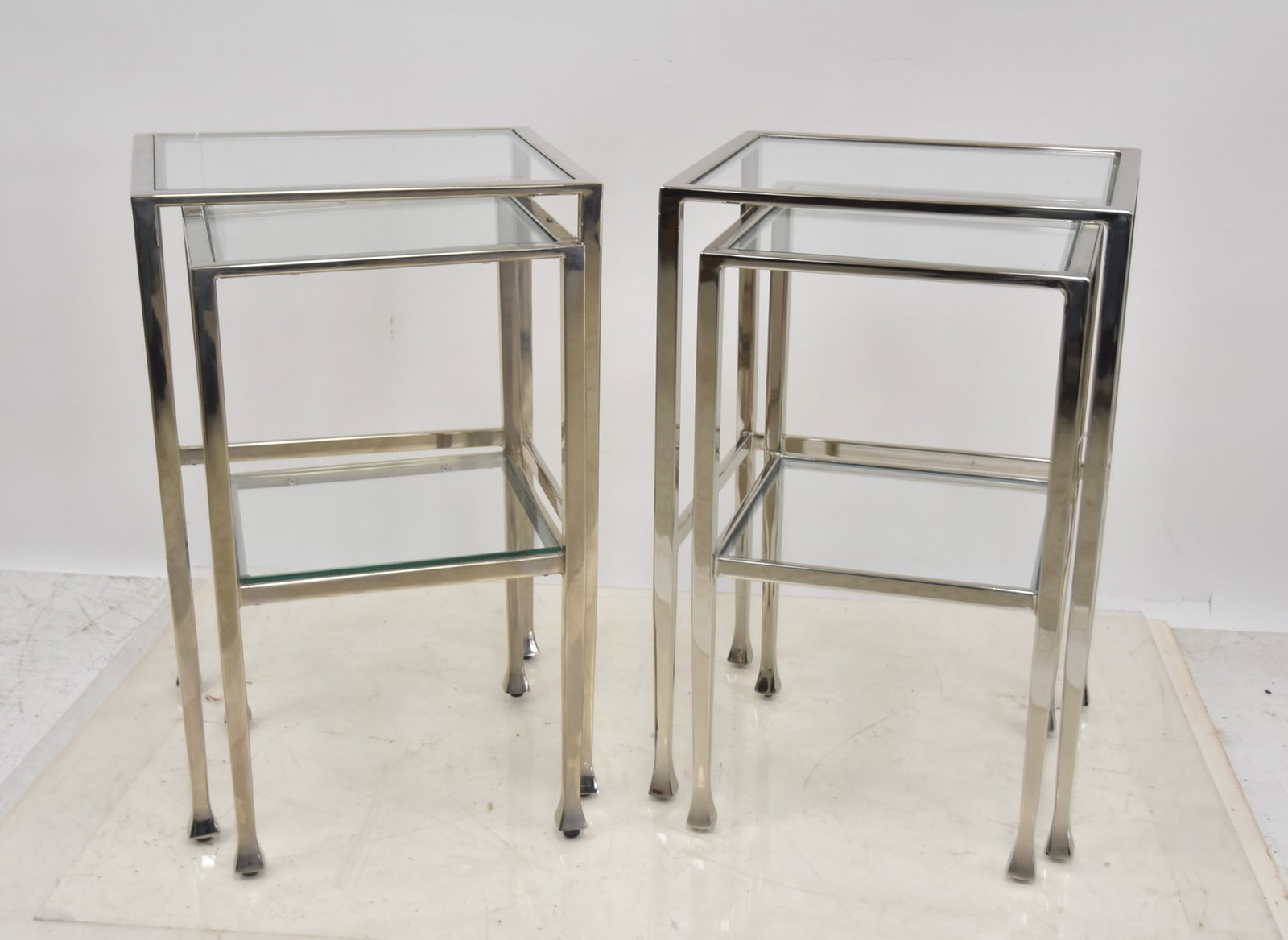 (2)pr CHROME & GLASS NESTING TABLES: (2) PAIRS OF CHROME 2-ART NESTING TABLES WITH GLASS SHELVES - 16" x 14" x 24 1/2"
