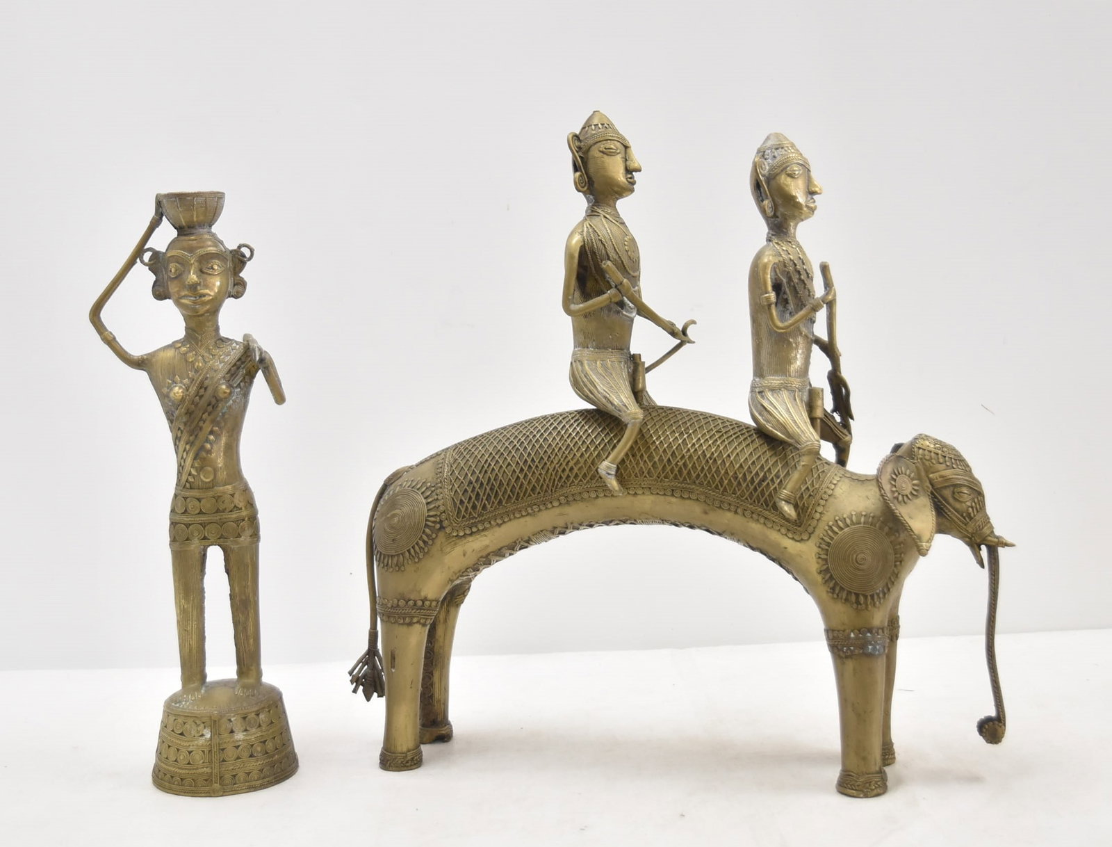 TIBETAN STYLE BRONZE FIGURES ON ELEPHANT: TIBETAN STYLE BRONZE FIGURES ON ELONGATED ELEPHANT & SINGLE BRONZE BRONZE ; 21" x 5" x 22" ; 19" TALL