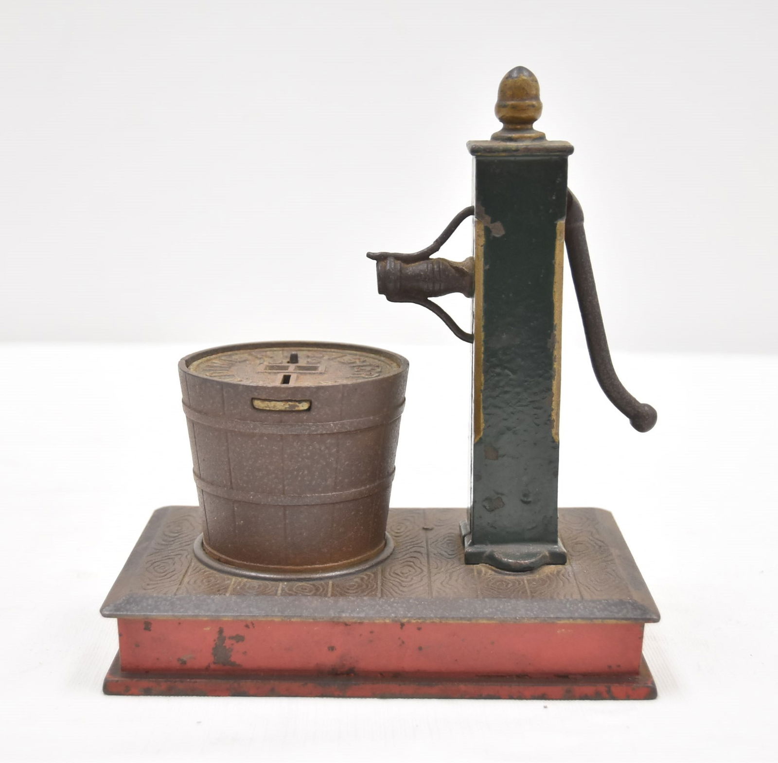 PUMP AND BUCKET MECHANICAL BANK. (1 of 14)