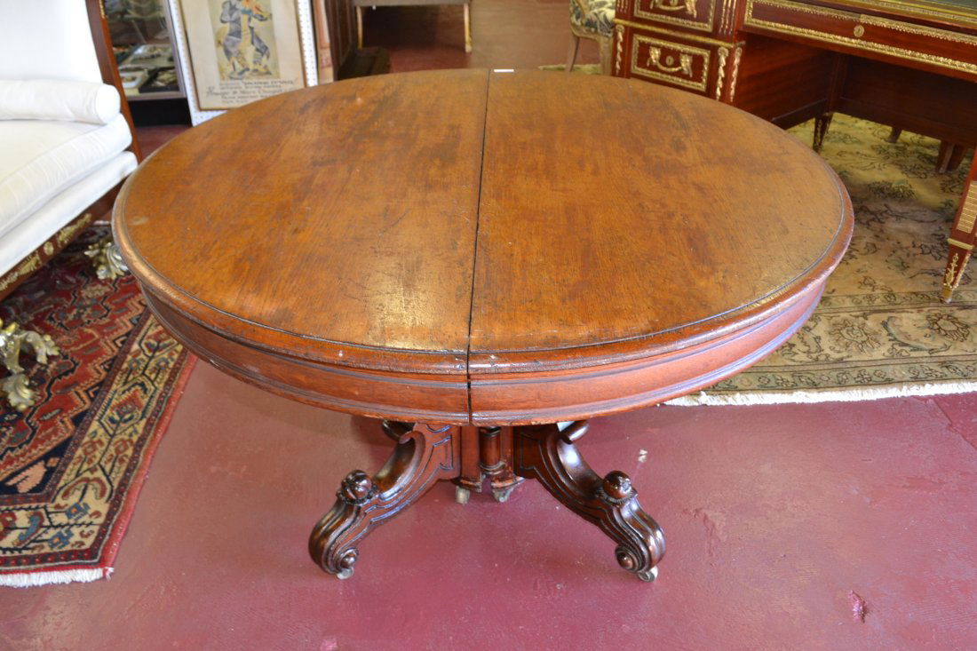 ROUND OAK DINING TABLE WITH (6) LEAVES: 48" x 30" & LEAVES ARE 16" (SOME FINISH WEARING)