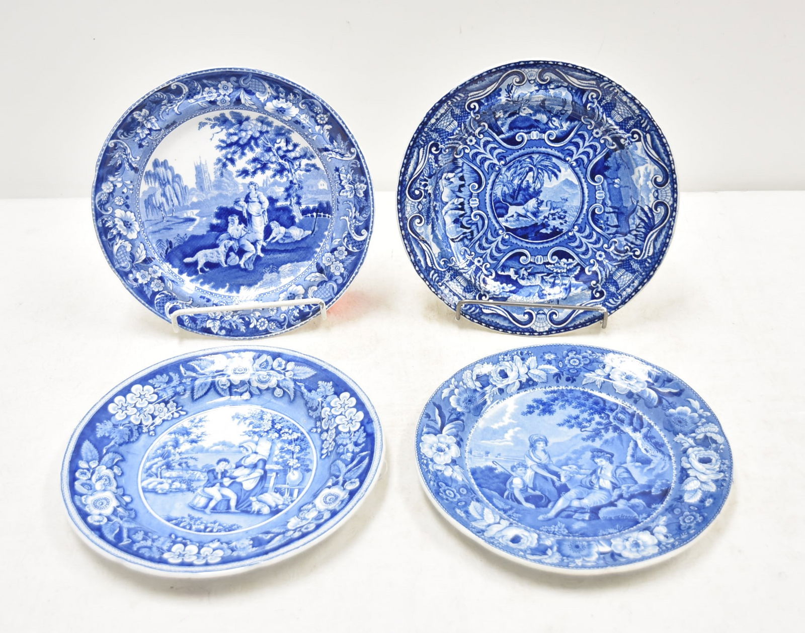 (4) ANTIQUE 19thC BLUE & WHITE TRANSFERWARE PLATES: JOHN HALL QUADREPED LION BLUE & WHITE TRANSFERWARE PLATE / PASTORAL SCENE BLUE & WHITE TRANSFERWARE PLATE , ca. 1822-1824 / DAVENPORT BLUE & WHITE TRANSFERWARE COURTING SCENE / EDWARD AND GEORGE PHILI