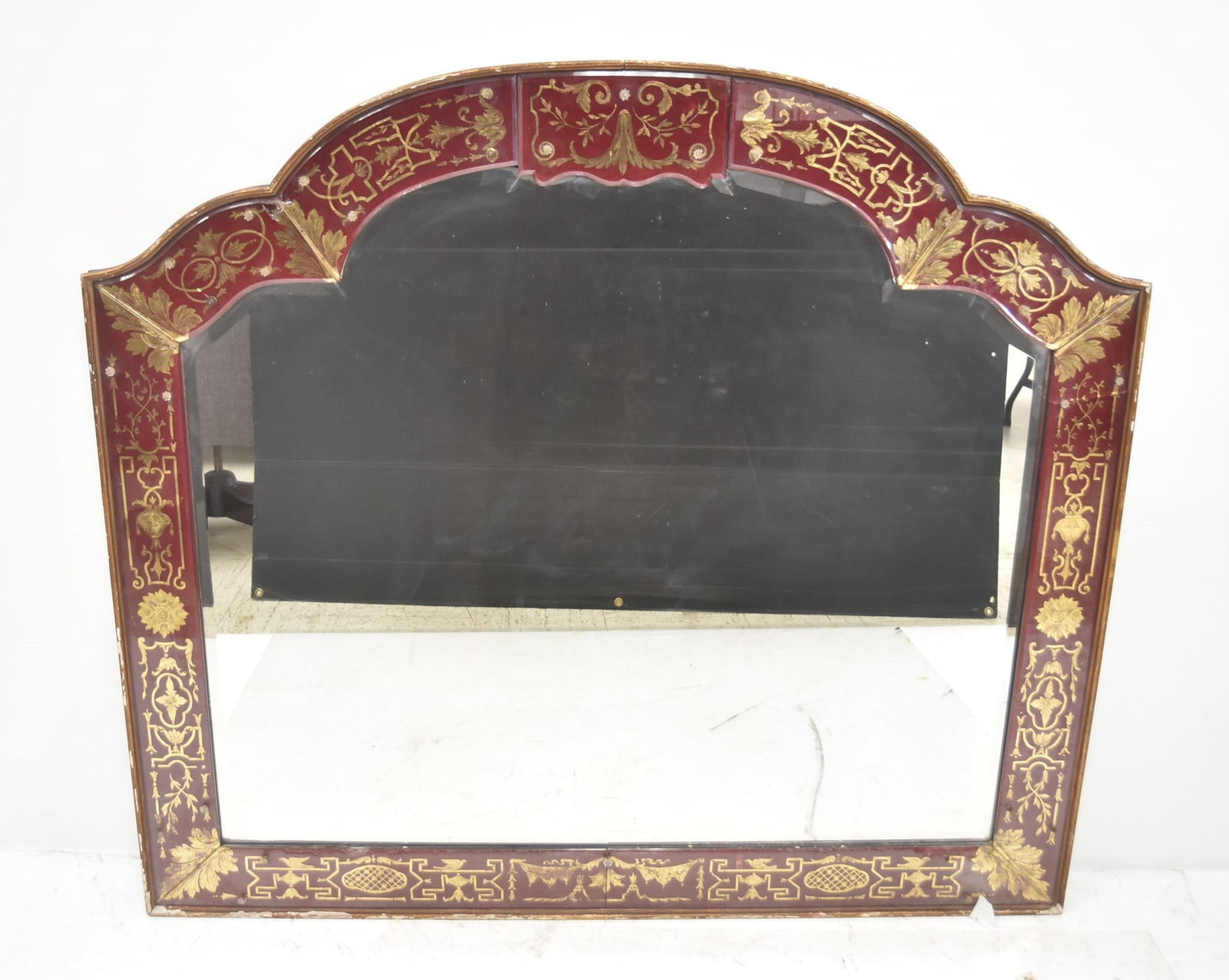 VENETIAN RED & GOLD EGLOMISE MIRROR: ANTIQUE VENETIAN RED & GOLD EGLOMISE GLASS MIRROR WITH BEVELED MIRROR - 51" x 45 1/2" (ONE PANEL HAS CHIP ; ONE PANEL HAS CRACK)