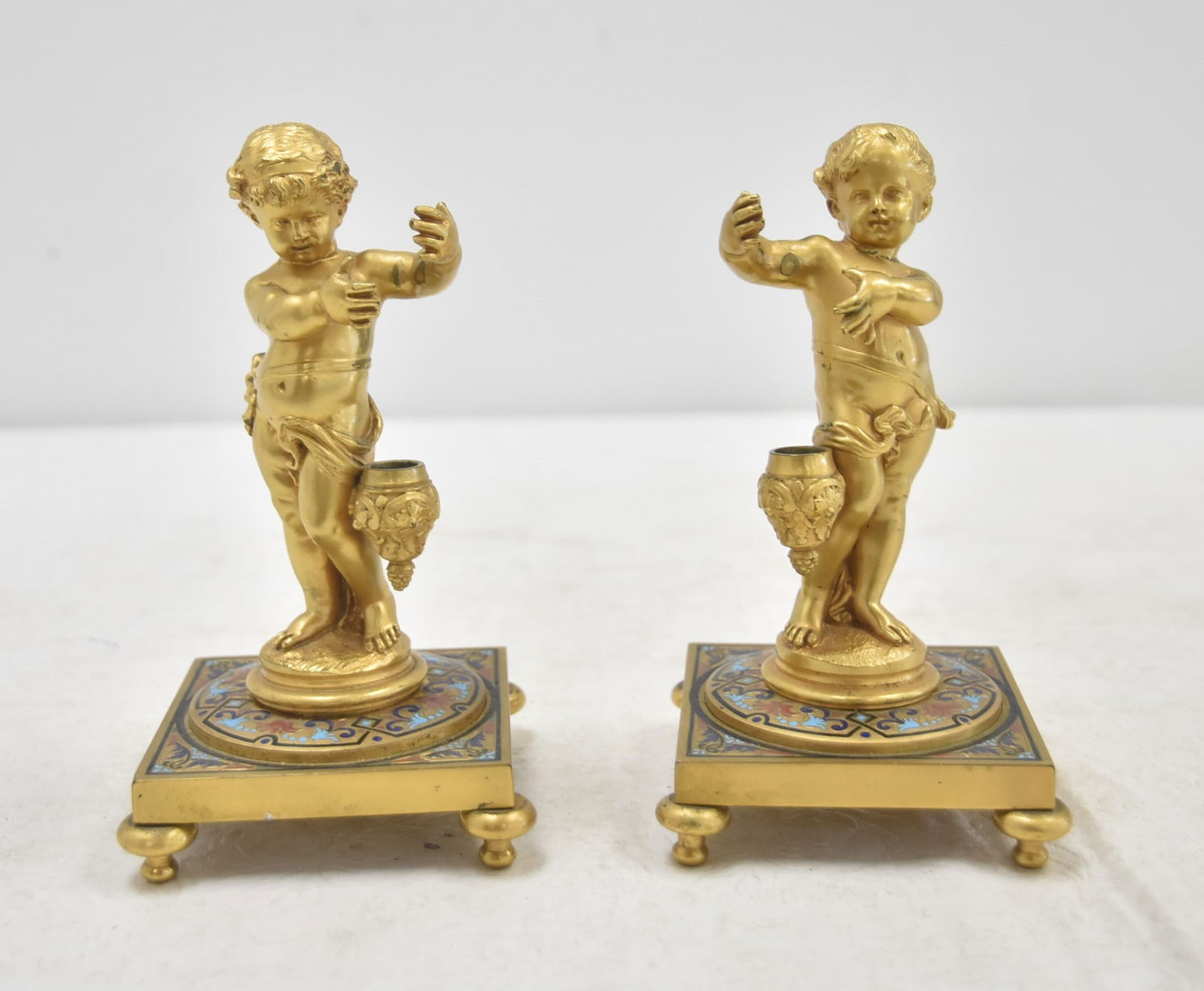 (Pr) DORE BRONZE & CHAMPLEVE CHERUBS: (Pr) DORE BRONZE & CHAMPLEVE CHERUBS - 3 1/4" x 3 1/4" x 6" (MISSING EPERGNES)