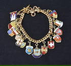 14kt & 18kt GOLD CHARM BRACELET WITH (17) CHARMS