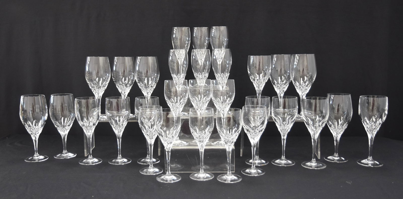 (24) GORHAM "DIAMOND" PATTERN CRYSTAL STEMWARE: (24) GORHAM DIAMOND CLEAR CRYSTAL STEMWARE GLASSES INCLUDING (16) WATER GOBLETS - 8 1/2" , (8) WINE GLASSES - 7 5/8" , (7) FLUTED CHAMPAGNE GLASSES - 8 1/2" , (3) WINE GLASSES - 8 1/4" "LIKE NEW CONDI