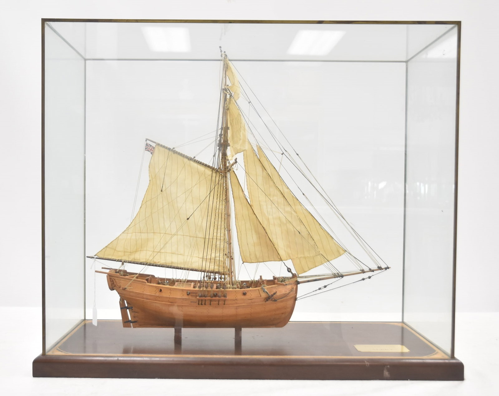 1777 English Cutter "Alert" Model Ship: HAND MADE ENGLISH MODEL SHIP OF ENGLISH CUTTER SHIP "ALERT" MOUNTED ON PARQUETRY INLAID WOOD BASE Hand built plank on bulkhead model on the 1777 English Cutter "Alert". Scale is 1:4831 1/2" x 13" x 26