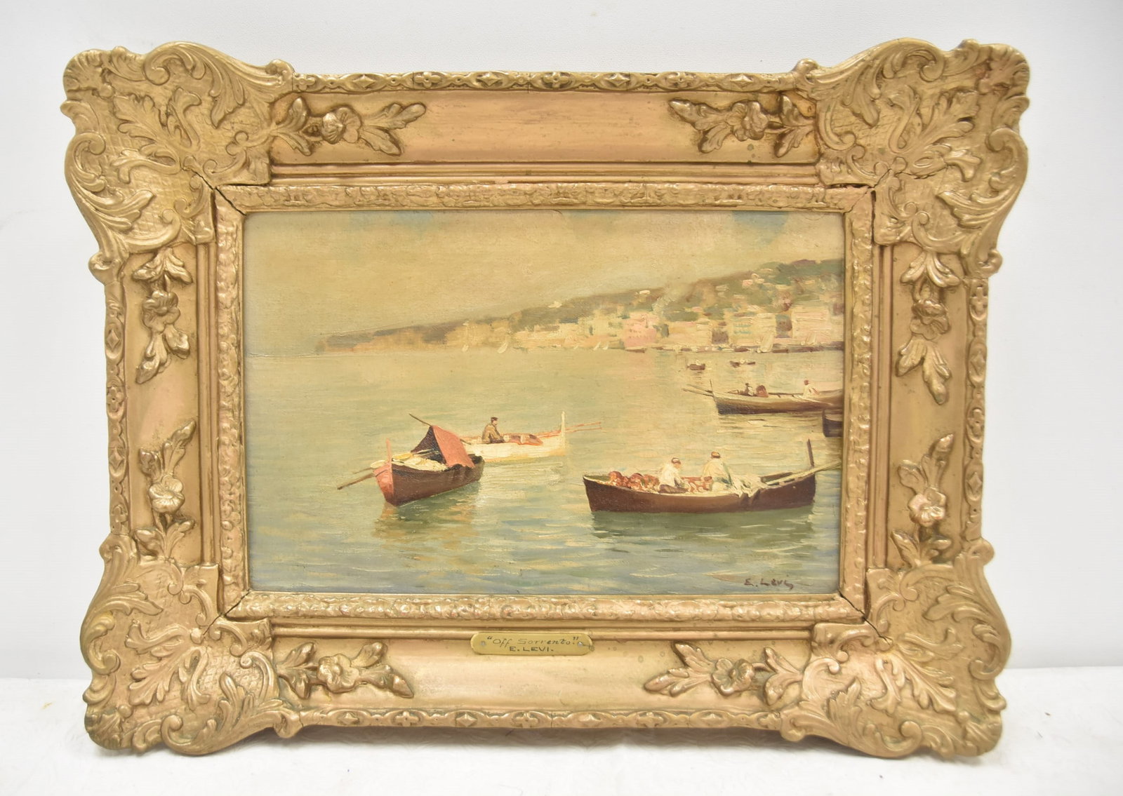JULIAN EDWIN LEVI , OIL ON CANVAS ROWBOATS: JULIAN EDWIN LEVI (AMERICAN, 1900-1982) OIL ON CANVAS OF ROW BOATS AT SEA , TITLED "OFF SORRENTO" , SIGNED E. LEVI , LOWER RIGHT - 13" x 8 1/2" ; 18" x 14" OVERALL