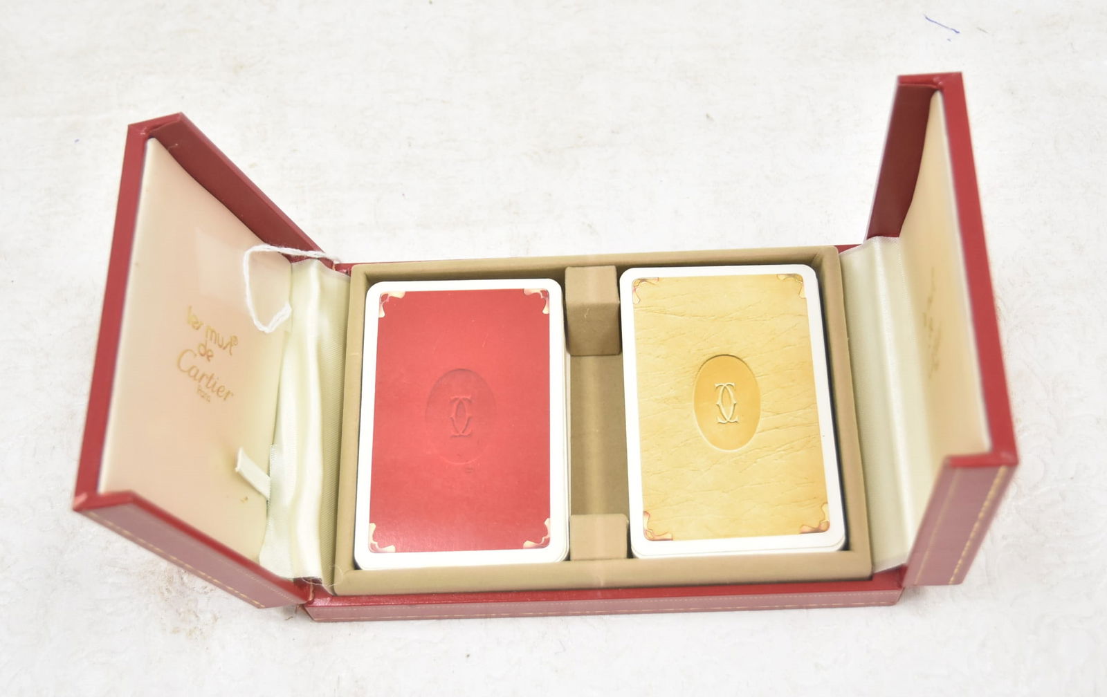 CARTIER PLAYING CARD SET: LES MUST DE CARTIER PLAYING CARD SET ; LIKE NEW IN CARTIER BOX - 6 1/2' x 4 1/2" x 1 1/2"