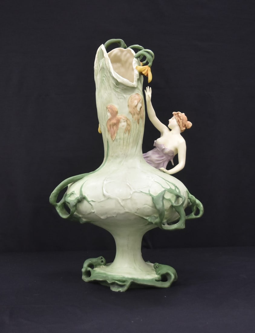 MONUMENTAL AMPHORA SNOW DROP VASE: MONUMENTAL AMPHORA SNOW DROP VASE WITH LARGE ART NOUVEAU FEMALE NUDE WRAPPED AROUND VASE WITH FEMALE MASKS OF THE THREE FATES - 14" x 9" x 24" Large Amphora Art Nouveau ''Snow Drop'' porcelain vase wi