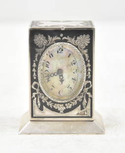 GUBELIN SWIIS 935 SILVER & ENAMEL MINIATURE CLOCK: GUBELIN JTC , SWISS 935 STERLING SILVER & GUILLOCHE ENAMEL MINIATURE CLOCK , MARKED 935 ARGENT , MARKED JTC - 2" x 1 1/4" x 2 3/4"clock is currently running and keeping good timeSome minor enamel loss