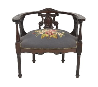 CARVED MAHOGANY CORNER CHAIR WITH NEEDLEPOINT