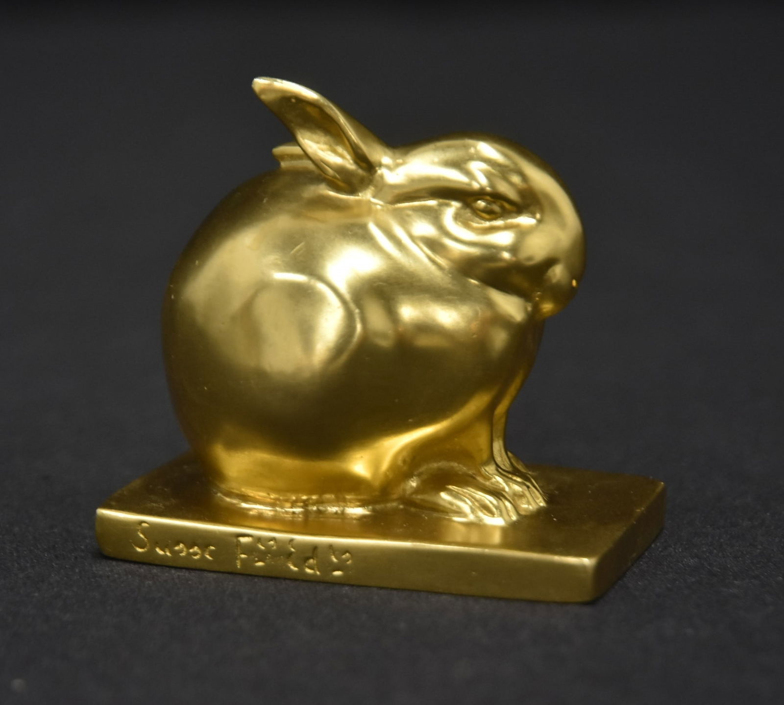 AFTER EDOUARD MARCEL SANDOZ "LAPIN BIJOU": ATTRIBUTED TO EDOUARD-MARCEL SANDOZ (SWITZERLAND, 1881-1971)GILDED BRONZE SEATED RABBIT , "LAPIN BIJOU" SIGNED ED M SANDOZ ; WITH SUSSE FRERES FOUNDRY - 2 1/2" x 1 1/2" x 2 1/2"