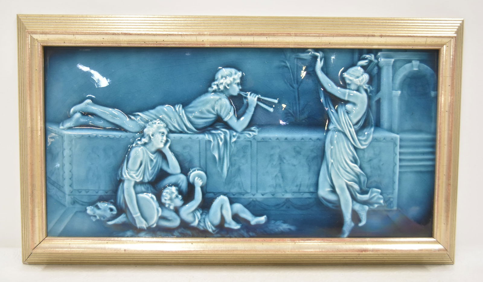 TRENT TILE Co . GLAZED ALLEGORICAL TILE PLAQUE: ATTRIBUTED TO TRENT TILE Co. GLAZED ALLEGORICAL RELIEF FIGURAL TILE PLAQUE - TILE IS 17 1/2" x 9" ; 20" x 11 1/2'