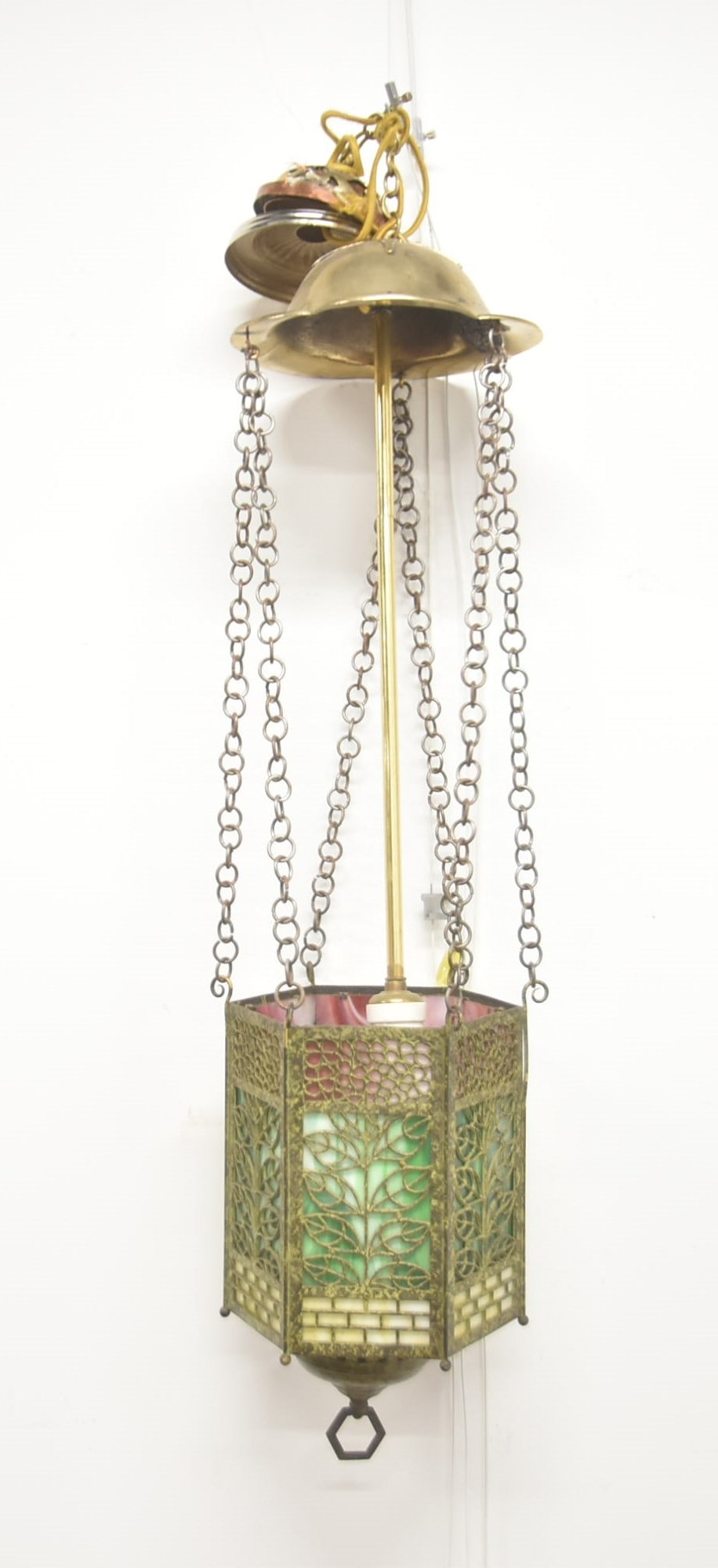 B & H MULTI COLOR LEADED GLASS LANTERN: B & H BRADLEY & HUBBARD FROG FINISH GREEN PATINATED MULTI COLOR LEADED GLASS HANGING LANTERN ; WITH FOLIATE FILIGREE OVER (18) MULTI COLOR PANELS ; HAVING ADDED HANGING SUPPORTS - LANTERN IS 8" x 14" 