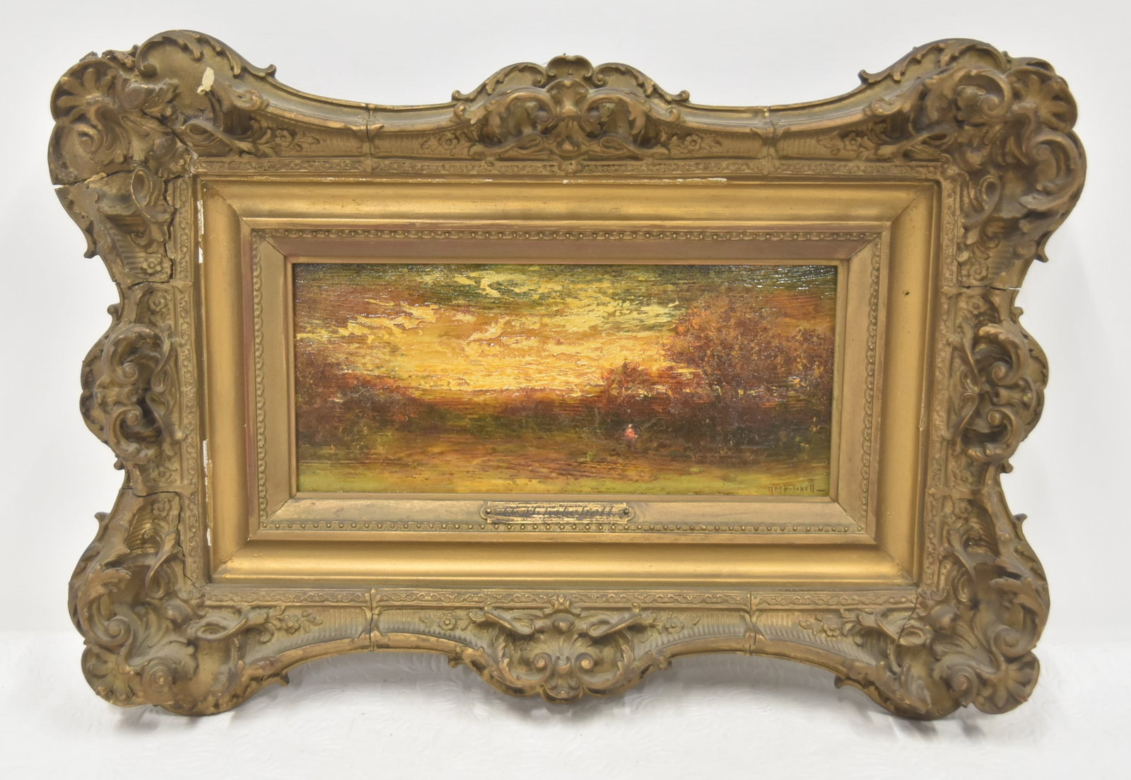 HUDSON MINDELL KITCHELL , OIL ON PANEL: HUDSON MINDELL KITCHELL (AMERICAN, 1862-1944) OIL ON PANEL BOARD PASTORAL WOODED LANDSCAPE , IN ANTIQUE GILDED GESSO FRAME , SIGNED HM KITCHELL , LOWER RIGHT - 9" x 4" ; 15" x 11" FRAMED (FRAME HAS SO