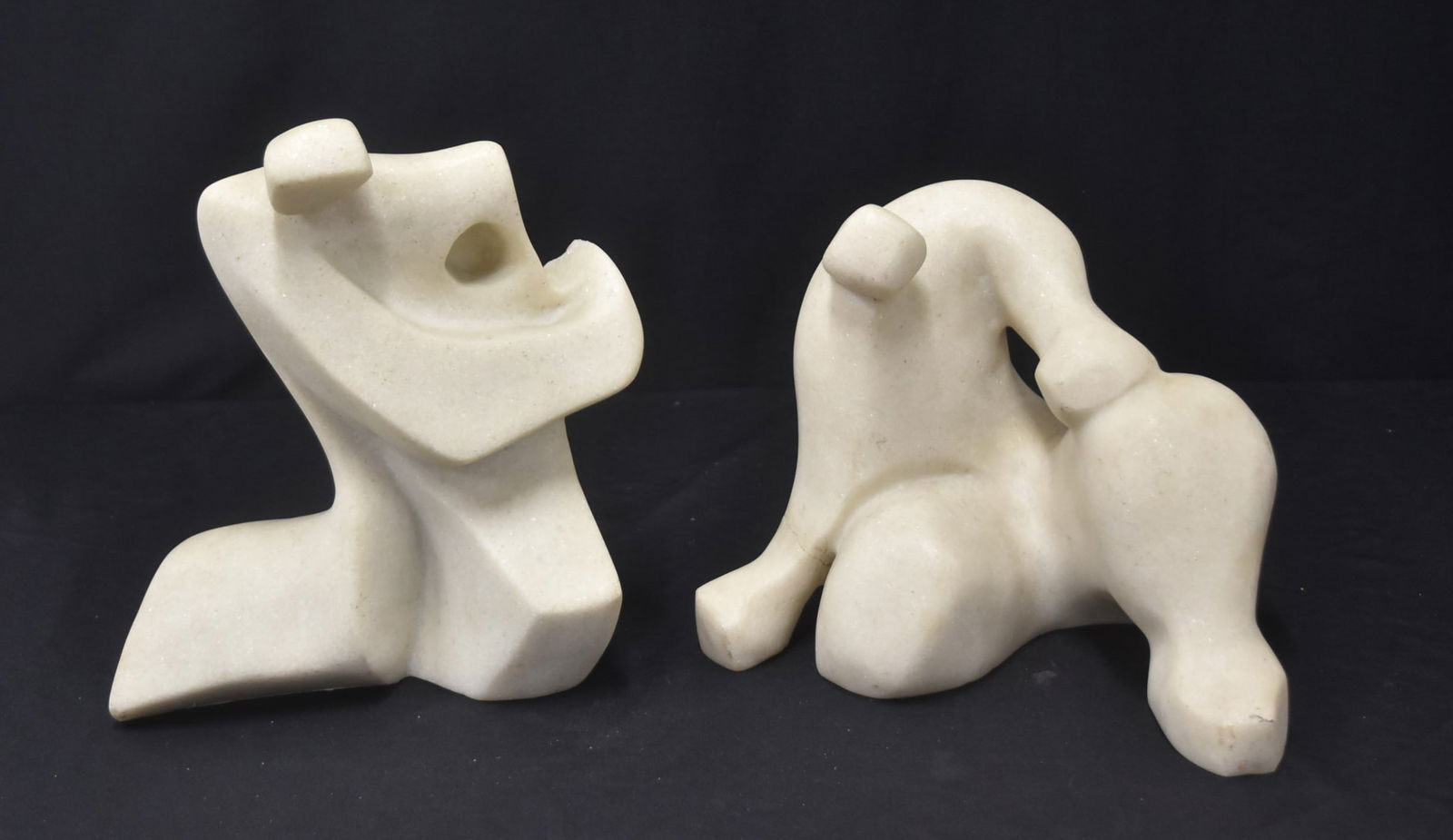 (2) CAST MARBLE ABSTRACT SCULPTURES: (2) CAST MARBLE ABSTRACT FIGURAL SCULPTURES , SIGNED - 10" x 5" x 10"