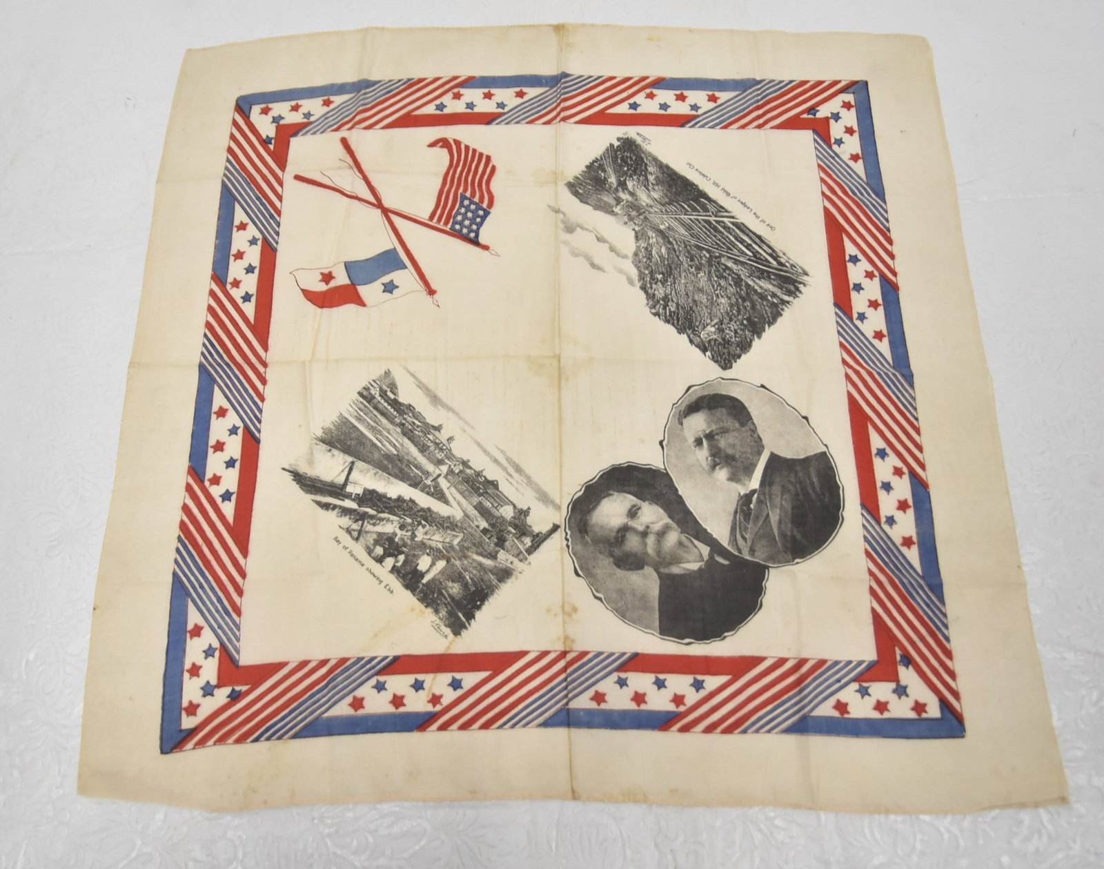 ROOSEVELT & CW FAIRBANKS JUGATE HANDKERCHIEF: Red, white, blue, and black printed silk campaign handkerchief with jugate portraits of the 1904 Republican presidential candidate Theodore Roosevelt and running mate Charles W. Fairbanks. Decorated w