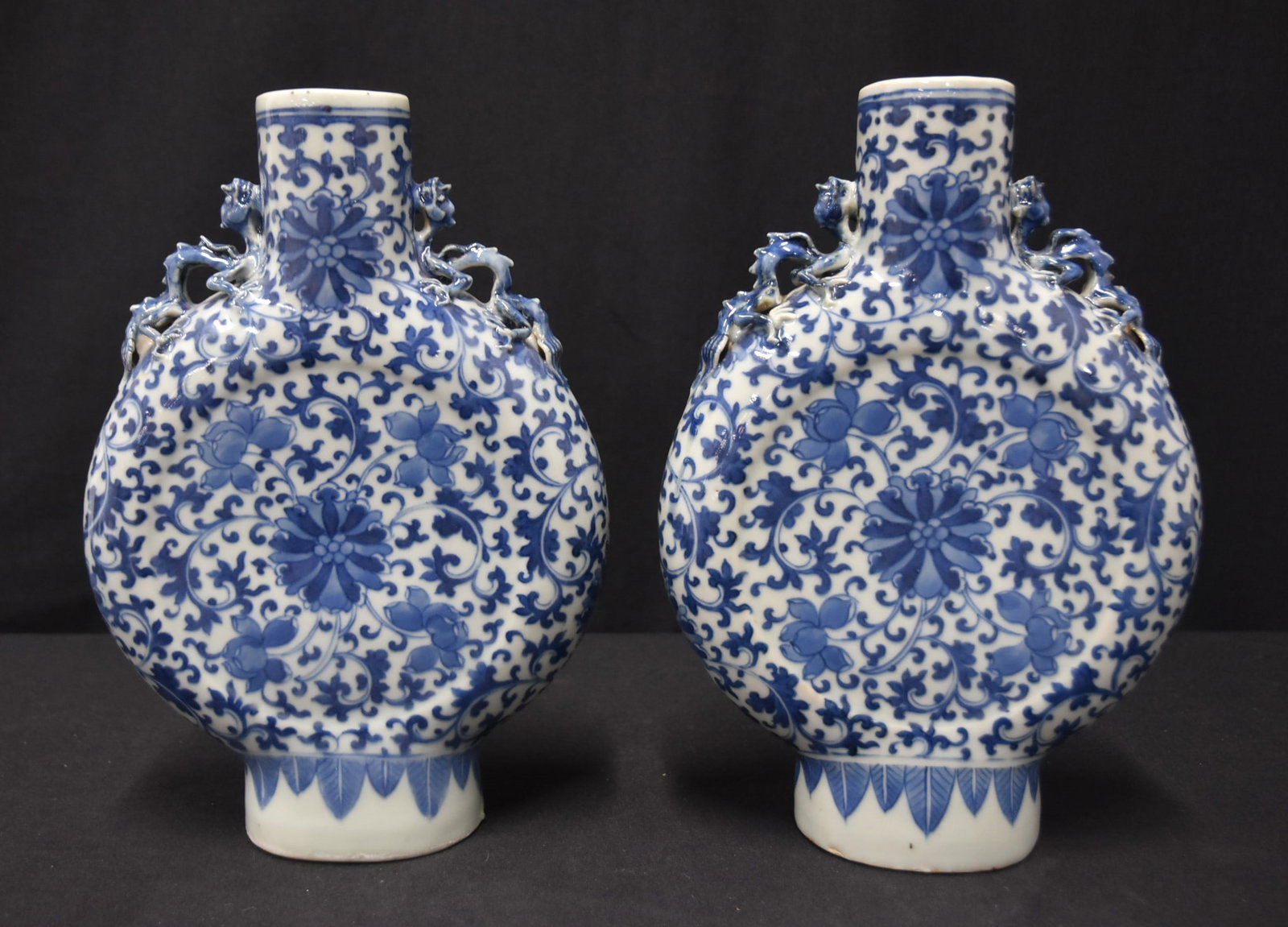 (Pr) CHINESE PORCELAIN BLUE & WHITE MOON FLASKS: PAIR CHINESE BLUE & WHITE PORCELAIN MOON FLASK BOTTLES - 7" x 2 1/2" x 10"