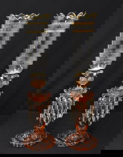 PAIR ANTIQUE BACCARAT STYLE LUSTRES: (Pr) ANTIQUE BACCARAT - SAINT LOUIS CRYSTAL CRANBERRY LUSTRES WITH UNSIGNED SAINT LOUIS - BACCARAT CRYSTAL HURRICANE SHADES WITH FLEUR DE LIS & GOLD TRIM - 13" x 23" OVERALL