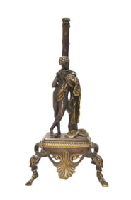BRONZE SEMI NIDE MAN LEANING ON TREE