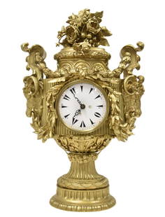 LARGE BRONZE FRENCH STYLE MANTLE CLOCK: LARGE TURKISH MARKET FRENCH STYLE BRONZE MANTLE CLOCK ADORNED WITH RAM HEADS & FLORAL GARLANDS ; HAVING ARABIC MARKERS ON ENAMEL FACE (BATTERY MOVEMENT) 17" x 8" x 25 1/2"