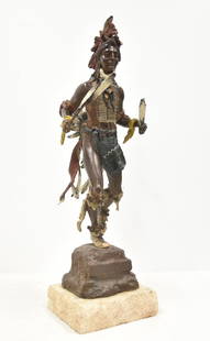 CARL KAUBA COLD PAINTED BRONZE NATIVE AMERICAN: CARL KAUBA (1865-1922) COLD PAINTED BRONZE NATIVE AMERICAN INDIAN DANCING , TITLED "GIFT DANCER" , WITH WESTERN FOUNDERS STAMP ; SIGNED C. KAUBA ; RAISED ON STONE PLYNTH BASE - 8" x 11" x 26"