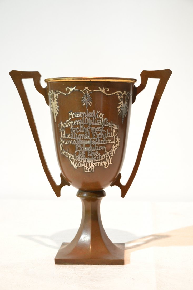 SILVERCREST BRONZE TROPHY WITH STERLING: PRESENTATION INSCRIPTION DATED 1921 - 10" x 11 1/2" (SOME SCRATCHES ON BASE)