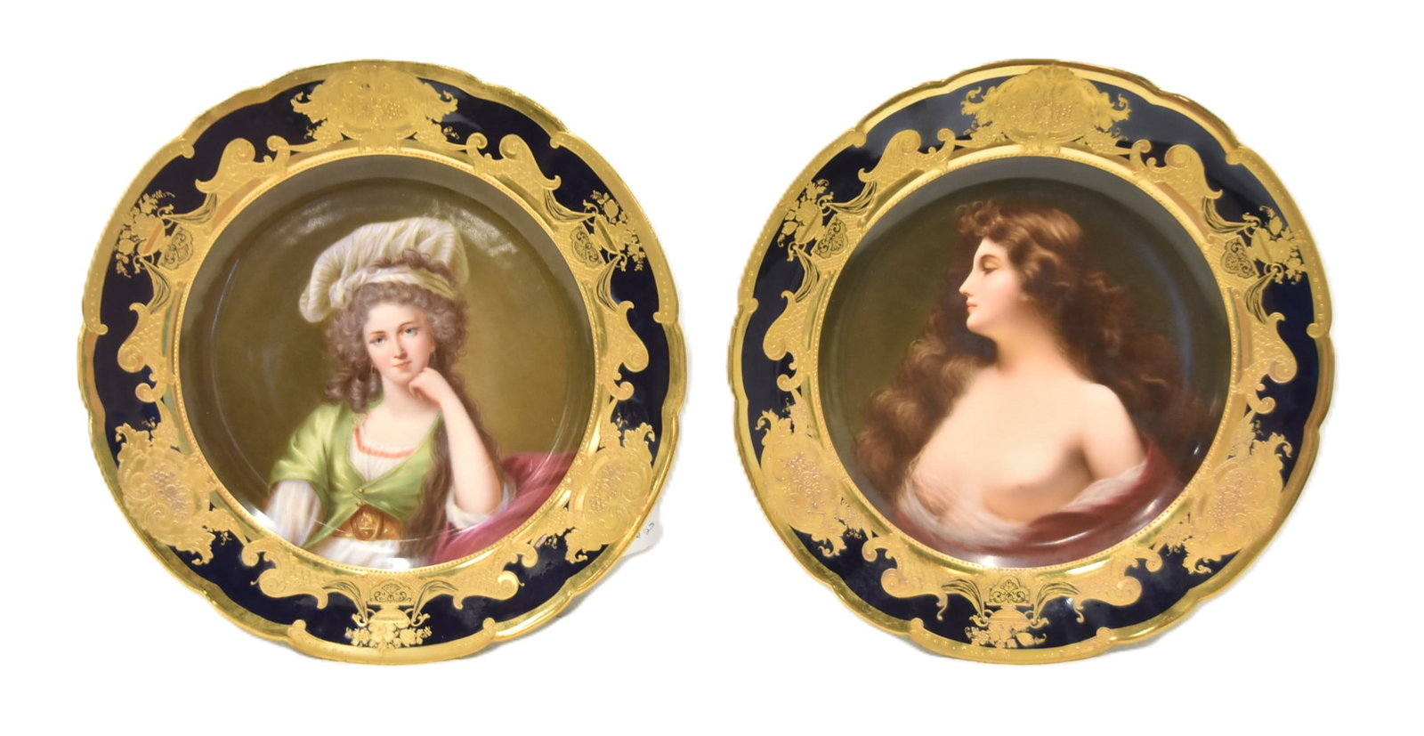 (2) DRESDEN LAMM PORCELAIN PORTRAIT PLATES: (2) DRESDEN AMBROSIUS LAMM PORCELAIN PORTRAIT PLATES - DRESDEN LAMM PORTRAIT OF SEMI NUDE WOMAN SURROUNDED BY BLUE & GOLD BORDER , TITLED "EPANQUISSEMENT" , TRANSLATED TO FULFILLMENT / DRESDEN AMBROSI