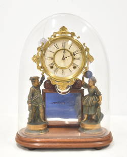 ANSONIA HJ DAVIES CRYSTAL PALACE CLOCK: ANSONIA HJ DAVIES CRYSTAL PALACE PARLOR CLOCK WITH DOME WITH MIRRORED FRONT FLANKED BY FIGURES ; HAVING DOME TOP - 14" x 7 x 19 (DOME HAS CRACK)