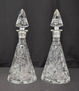(Pr) ANTIQUE CUT GLASS DECANTERS: PAIR ANTIQUE CUT GLASS DECANTERS WITH ETCHED FLOWERS - 5" x 13 1/2" (SOME ROUGH SPOTS ON STOPPERS)