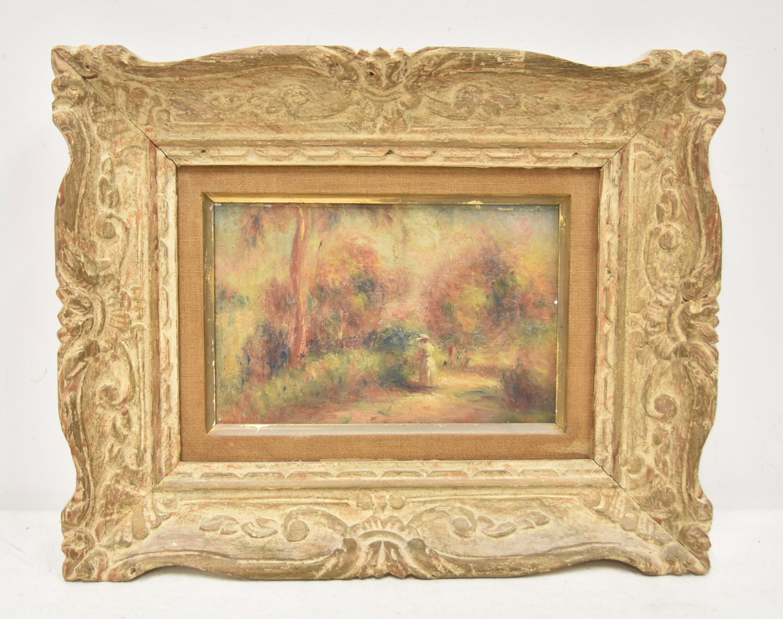 STYLE OF RENOIR ,OIL ON PANEL FIGURE IN LANDSCAPE: STYLE OF / ATTRIBUTED TO PIERRE-AUGUSTE RENOIR (1841-1919) OIL ON PANEL PAINTING OF FIGURE ON WOODED PATH , SIGNED R , LOWER LEFT , PANEL SIZE IS 9 1/4" x 6 1/2" ; OVERALL FRAMED IS 12" x 15"