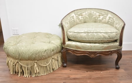 CARVED WALNUT BARREL CHAIR & OTTOMAN