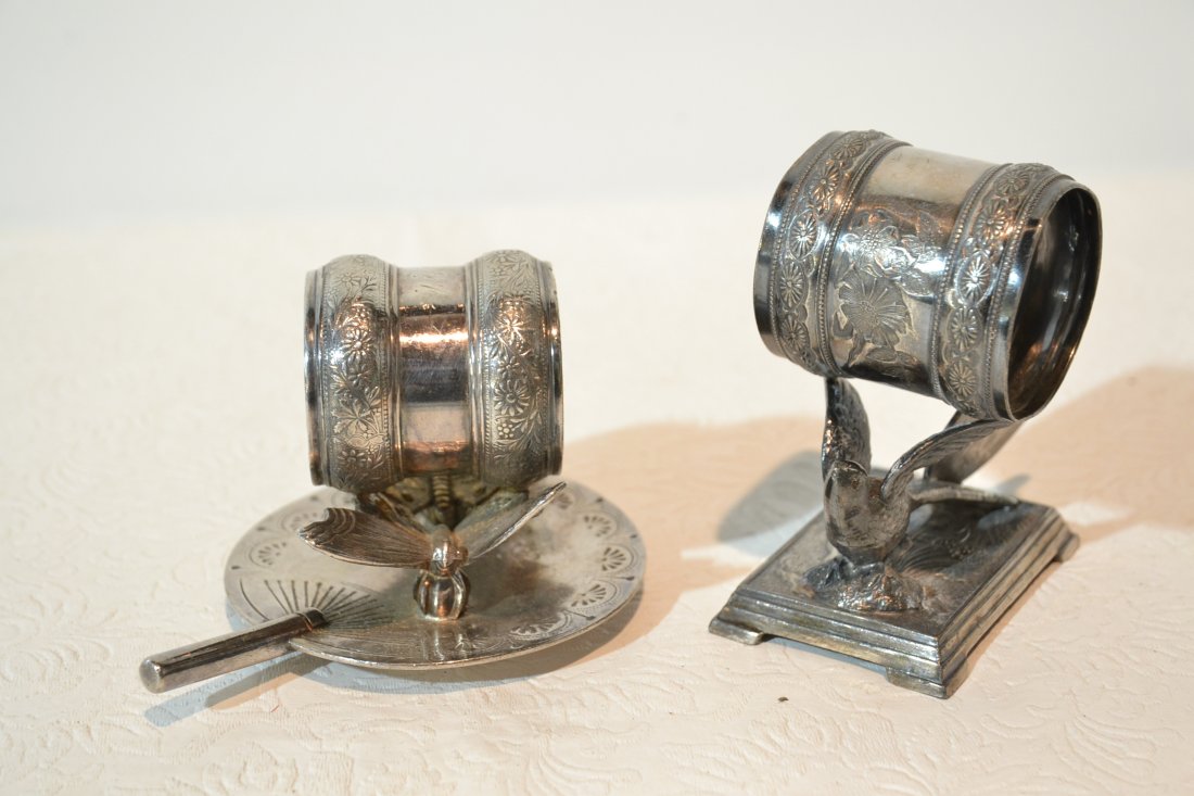 (2) SILVER PLATE NAPKIN RINGS INC- DERBY WITH: BIRD & MERIDIAN WITH BUTTERFLIES