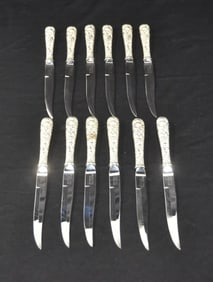 (12) KIRK STIEFF REPOUSSE STEAK KNIVES