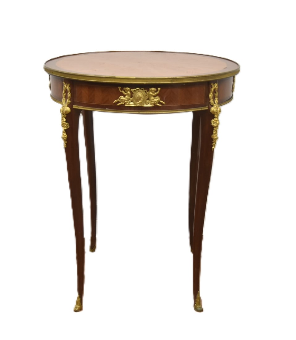 ROUND FRENCH STYLE BRONZE MOUNTED TABLE: ROUND FRENCH STYLE TABLE WITH PARQUETRY INLAY & BRONZE MOUNTED CHERUBS & MASKS - 23 1/2" x 30"